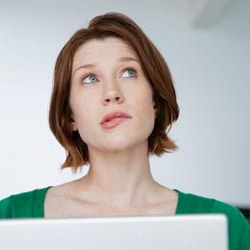 Woman looking unsure and pensive