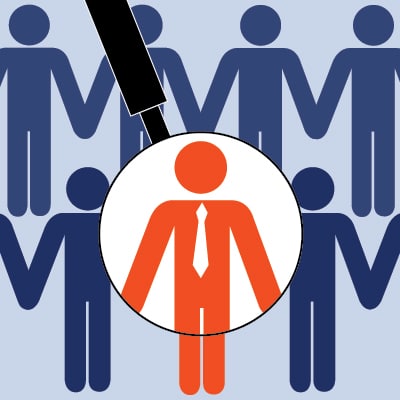 Graphic of rows of people icons with one person in a stand out colour under a magnifying glass