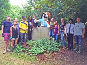 Fuel Recruitment team volunteering for Age UK posing for photograph with Harvey the Hound
