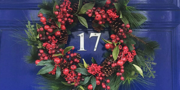 Merry Christmas_square-01 Christmas greeting message with wreathe on a blue door